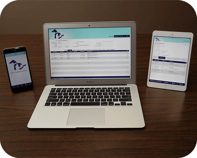 Laptop, mobile and iPad on table